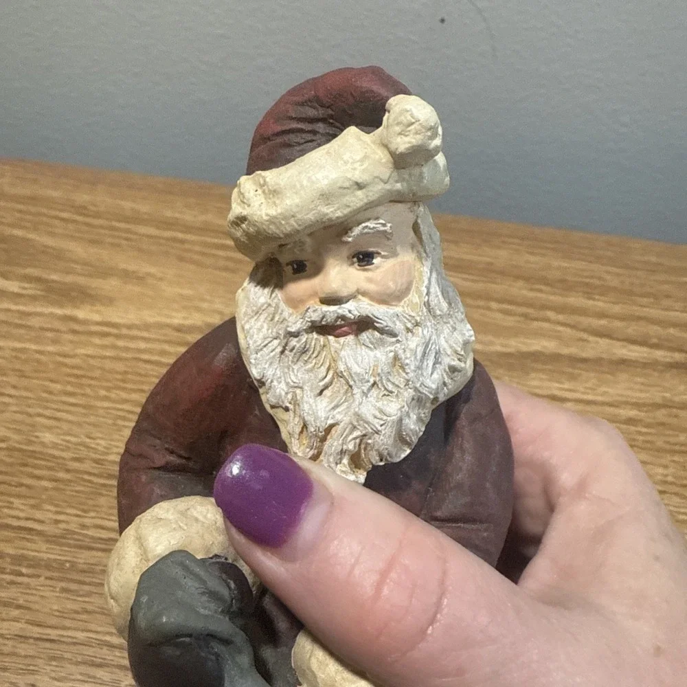 Santa Figurine Pulling‎ Toys Out Of A Sack